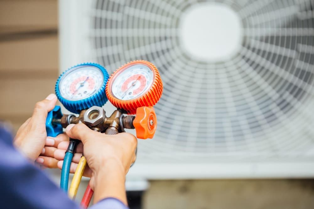 A close-up of dials indicating AC health